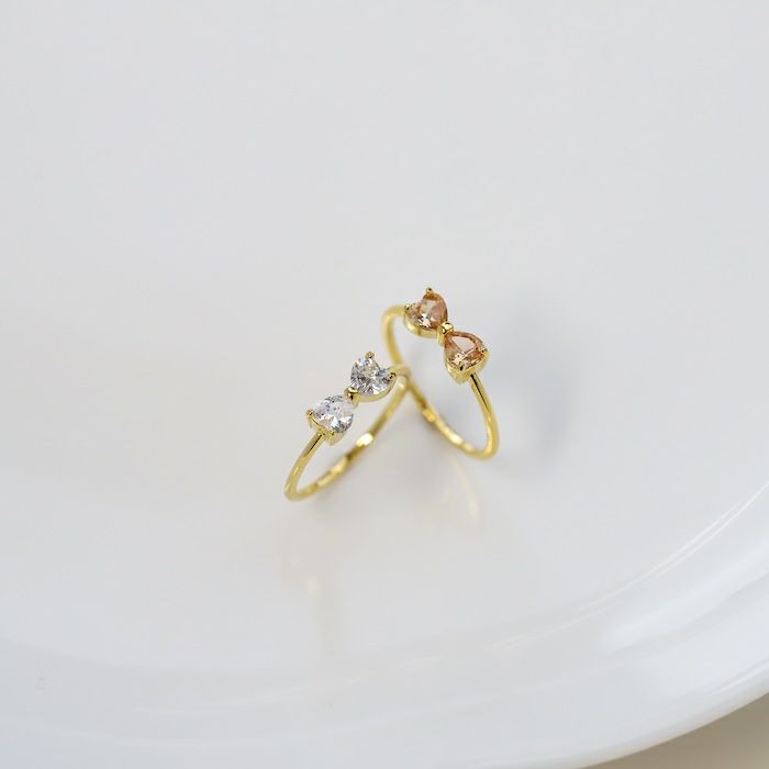 指輪レディースリングリボンキュービックジルコニアジュエルほそみかわいいファッションリングアクセサリー